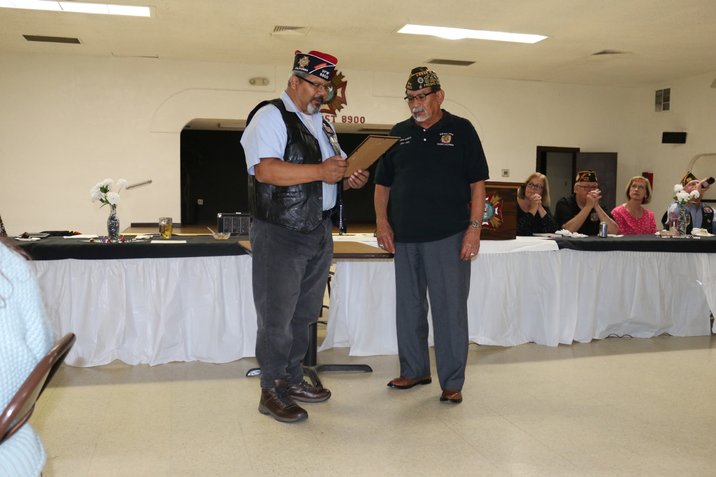 Commander Fernandez receives a District 9 Award presented by Senior Vice Commander Robert Alderete.